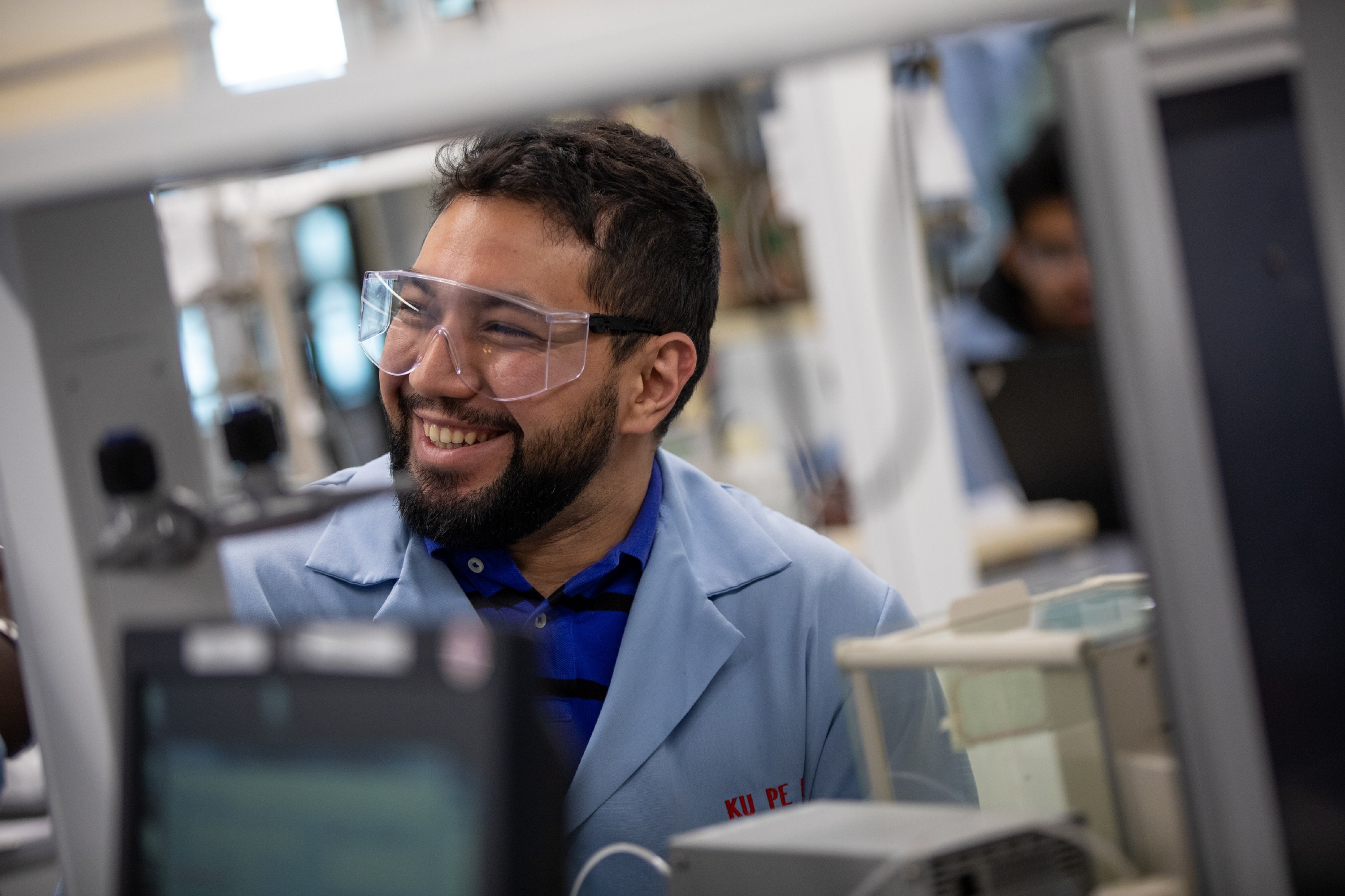 KU Petroleum Engineering individual in a lab