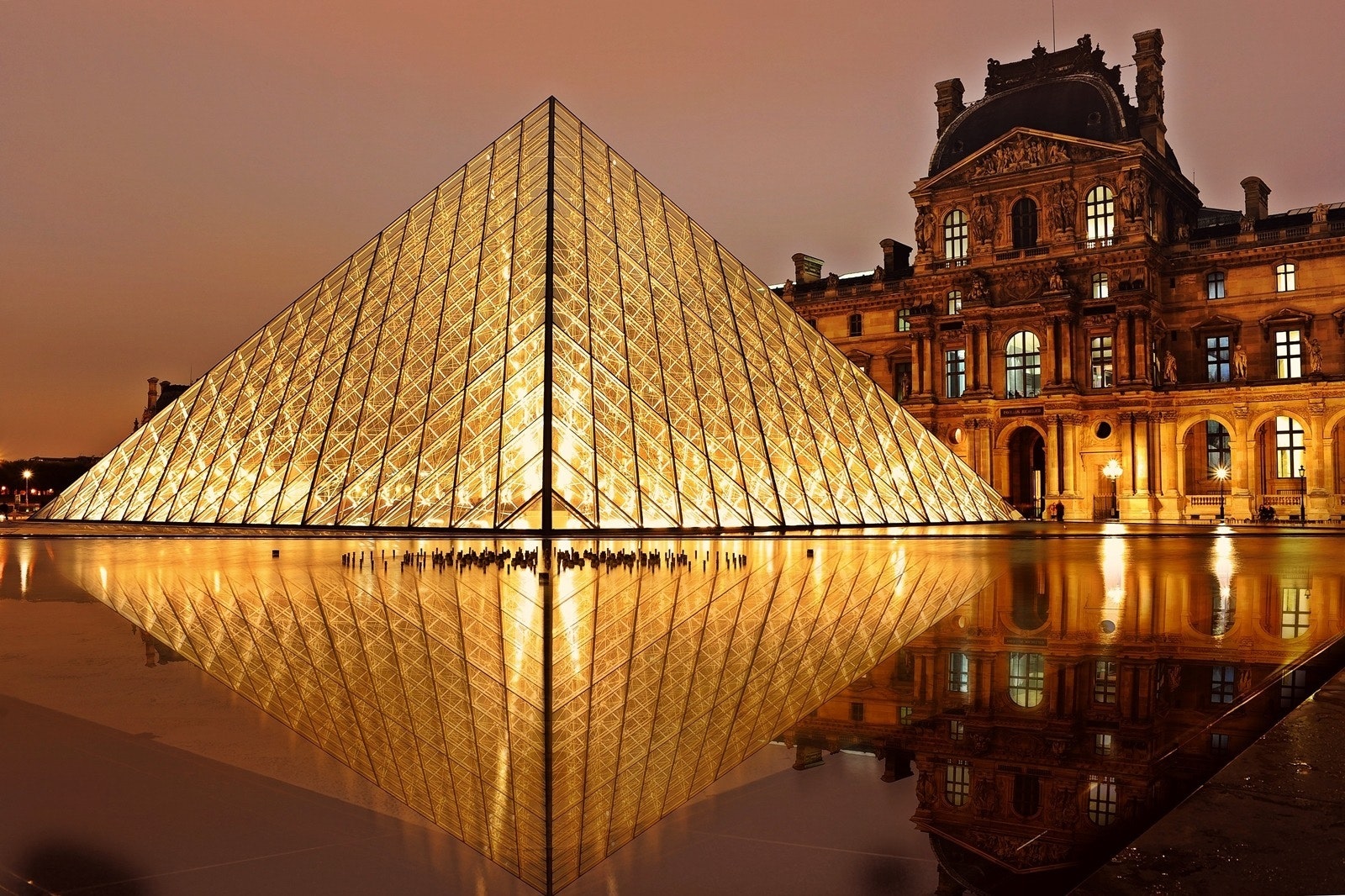 Glass pyramid of the Louvre Museum at night